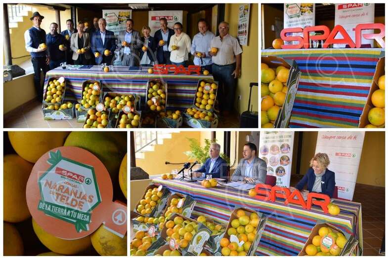 El presidente de Spar Gran Canaria, Ángel Medina, y el alcalde de Telde, Héctor Suárez, con citricultores del municipio (Foto TA)
